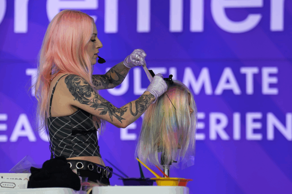 A live demonstration of a hair color application at the Premiere Beauty Show