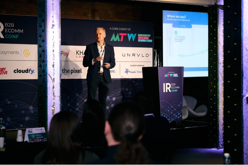 Speaker presenting insights at IR B2B eComm Conf