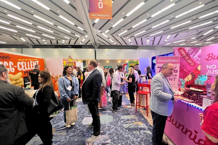 Natural Products Expo West attendees exploring exhibitor booths