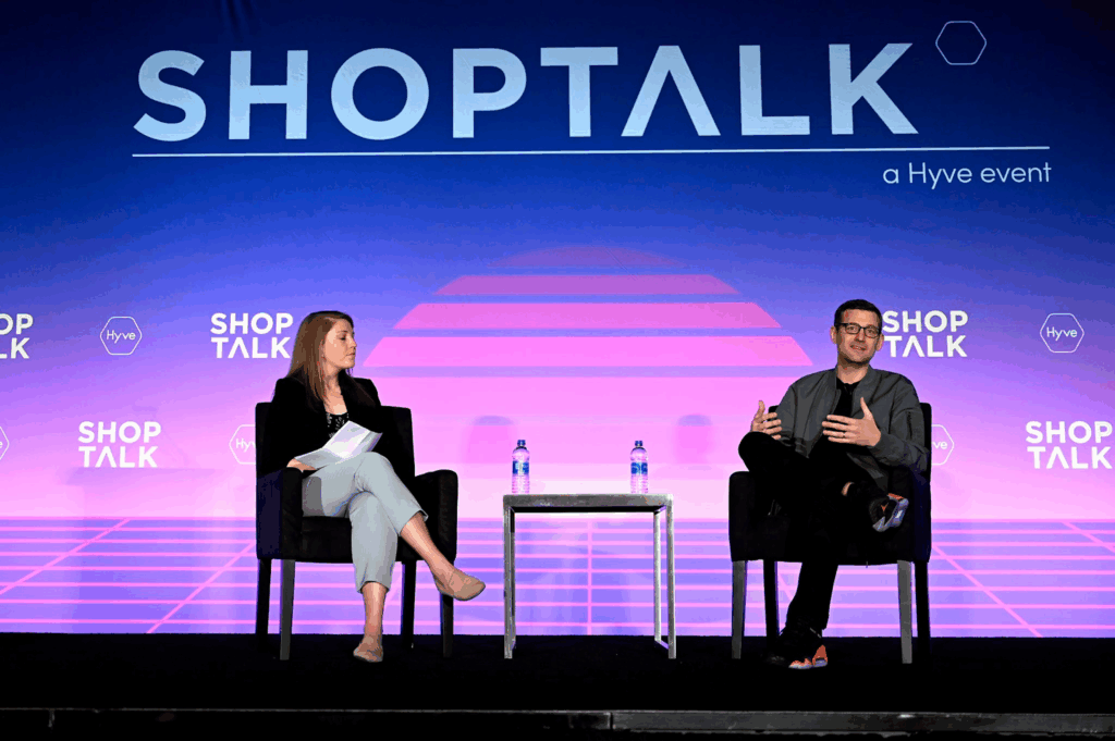 A fireside chat at a Shoptalk conference
